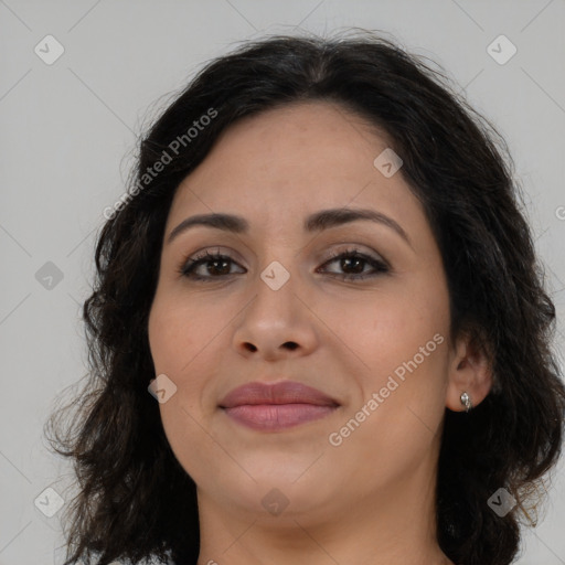 Joyful latino young-adult female with medium  brown hair and brown eyes