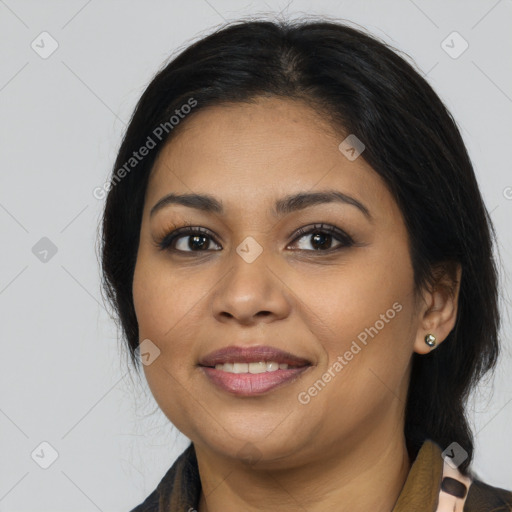 Joyful latino young-adult female with medium  brown hair and brown eyes