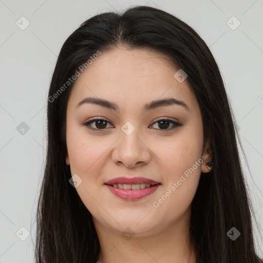 Joyful latino young-adult female with long  brown hair and brown eyes