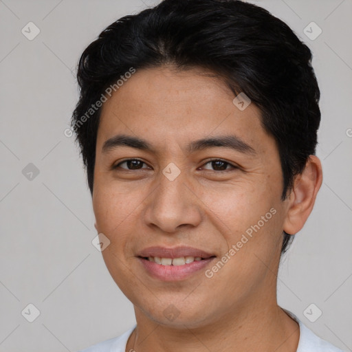 Joyful latino young-adult male with short  brown hair and brown eyes