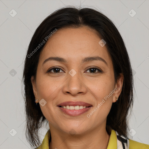 Joyful white adult female with medium  brown hair and brown eyes