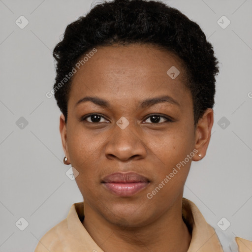 Joyful black young-adult female with short  black hair and brown eyes