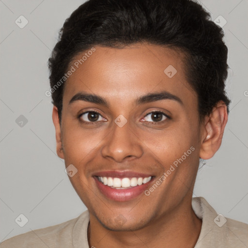 Joyful black young-adult female with short  brown hair and brown eyes