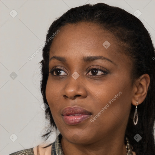 Joyful black young-adult female with medium  black hair and brown eyes