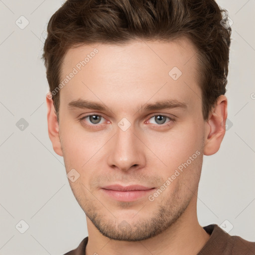 Neutral white young-adult male with short  brown hair and grey eyes