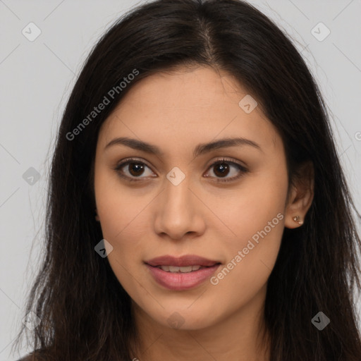 Joyful latino young-adult female with long  brown hair and brown eyes