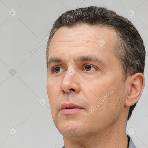 Neutral white adult male with short  brown hair and brown eyes