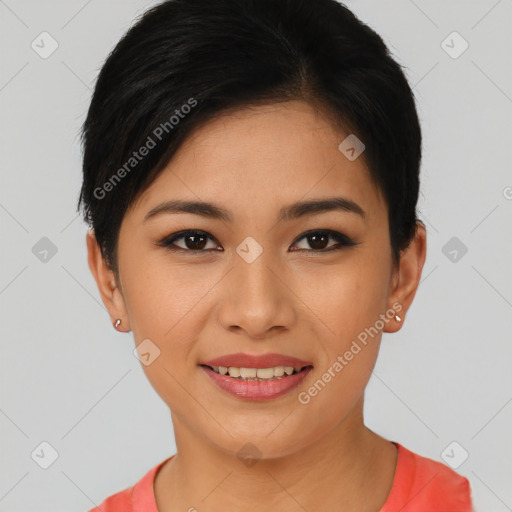 Joyful asian young-adult female with short  black hair and brown eyes