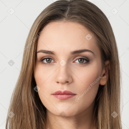 Neutral white young-adult female with long  brown hair and brown eyes