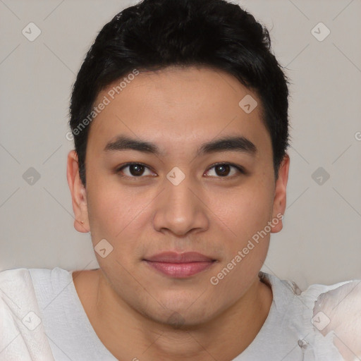 Joyful asian young-adult male with short  black hair and brown eyes