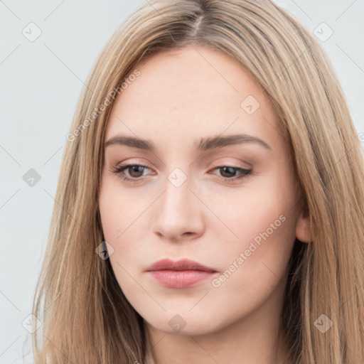 Neutral white young-adult female with long  brown hair and brown eyes