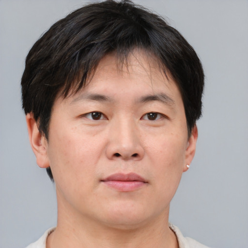 Neutral white adult male with short  brown hair and brown eyes