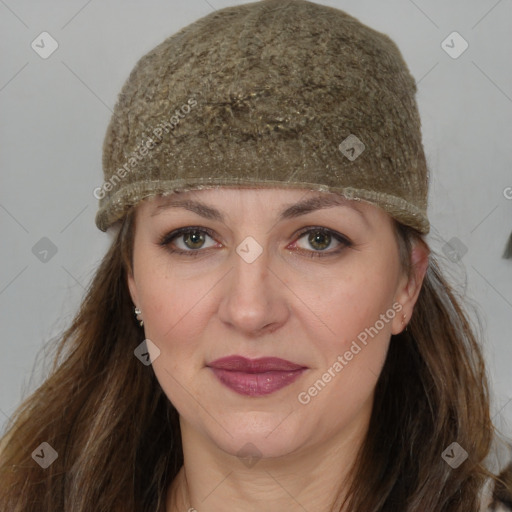 Joyful white adult female with medium  brown hair and grey eyes