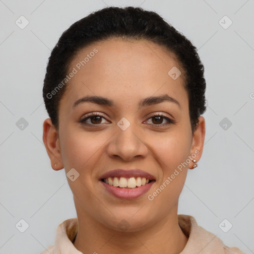 Joyful latino young-adult female with short  brown hair and brown eyes