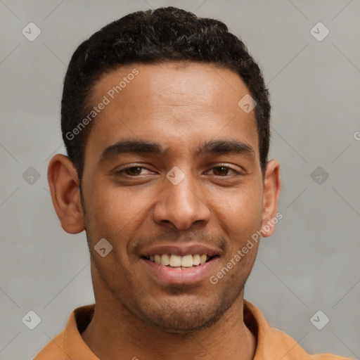 Joyful latino young-adult male with short  brown hair and brown eyes