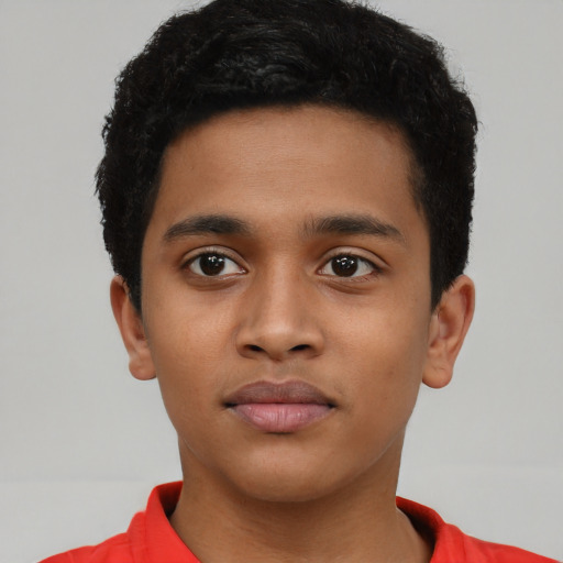 Neutral black child male with short  black hair and brown eyes