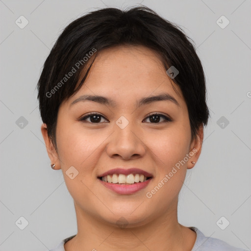 Joyful asian young-adult female with short  brown hair and brown eyes