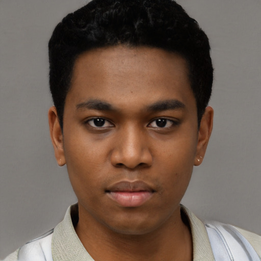 Neutral black young-adult male with short  black hair and brown eyes