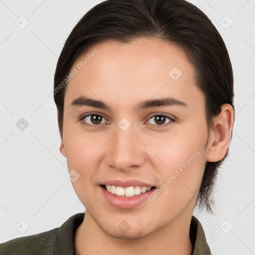 Joyful white young-adult female with medium  brown hair and brown eyes