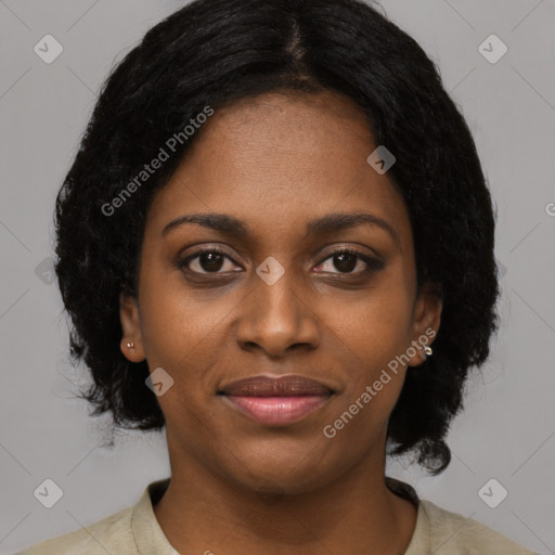 Joyful black young-adult female with medium  black hair and brown eyes