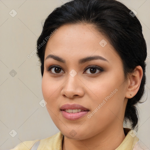 Joyful asian young-adult female with medium  brown hair and brown eyes