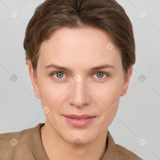 Joyful white young-adult female with short  brown hair and grey eyes