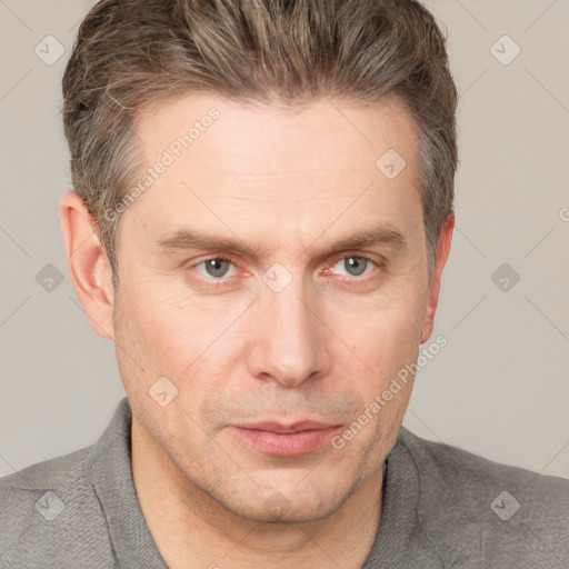 Neutral white adult male with short  brown hair and grey eyes