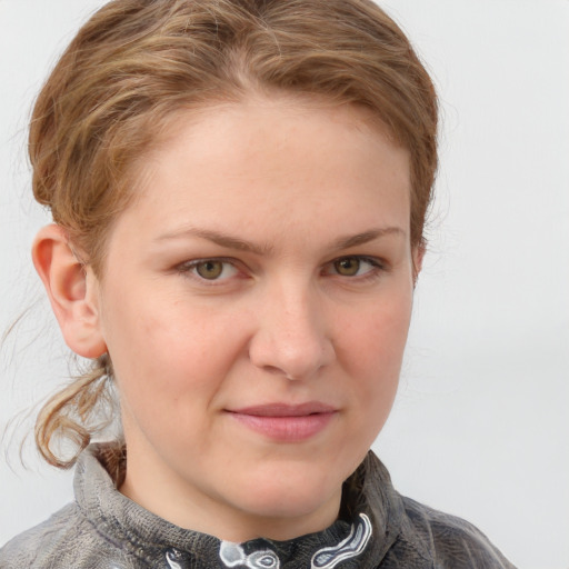 Joyful white young-adult female with medium  brown hair and blue eyes