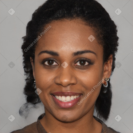 Joyful black young-adult female with medium  black hair and brown eyes