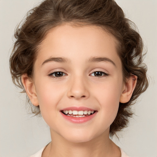 Joyful white child female with medium  brown hair and brown eyes