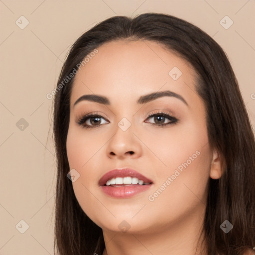 Joyful white young-adult female with long  black hair and brown eyes