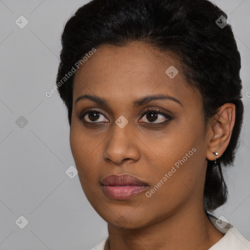 Neutral black young-adult female with short  black hair and brown eyes