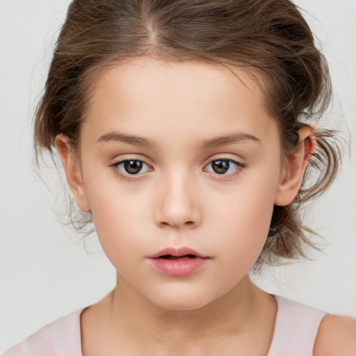 Neutral white child female with medium  brown hair and brown eyes