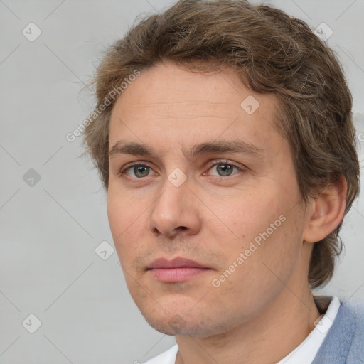 Neutral white adult male with short  brown hair and brown eyes