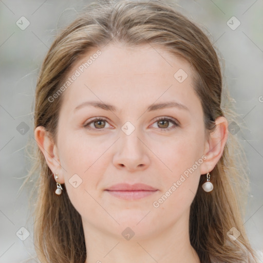 Joyful white young-adult female with medium  brown hair and blue eyes