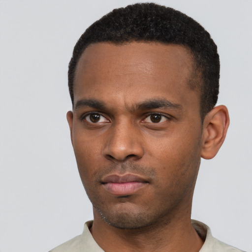 Neutral black young-adult male with short  black hair and brown eyes