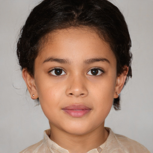 Joyful white child female with medium  brown hair and brown eyes