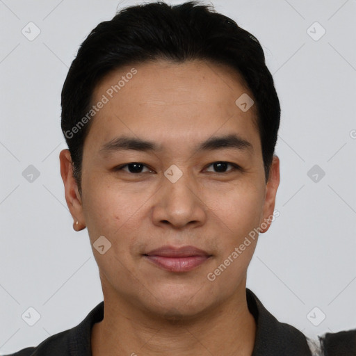 Joyful asian young-adult male with short  black hair and brown eyes