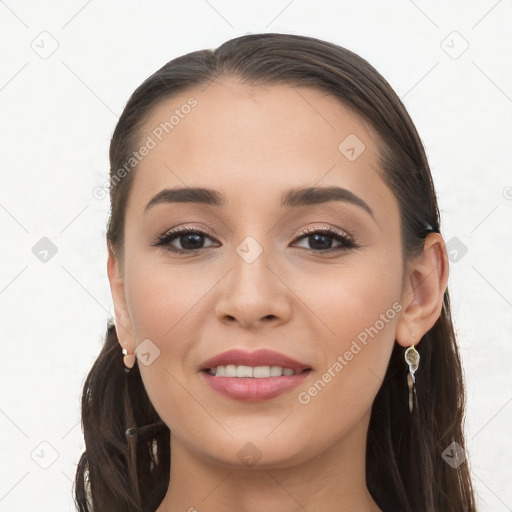 Joyful white young-adult female with long  brown hair and brown eyes