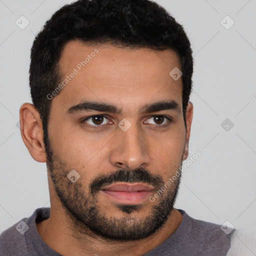 Neutral latino young-adult male with short  black hair and brown eyes