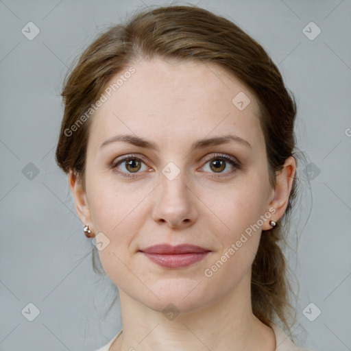 Joyful white young-adult female with medium  brown hair and green eyes