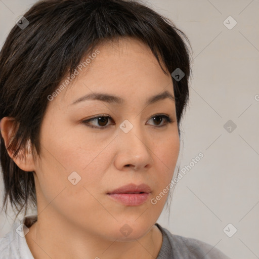 Neutral white young-adult female with medium  brown hair and brown eyes