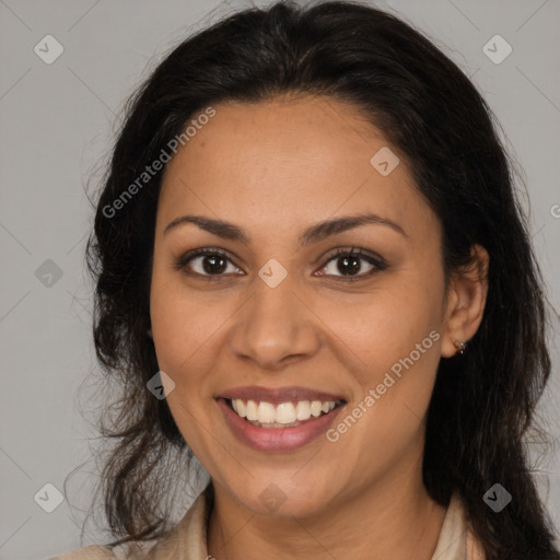 Joyful latino young-adult female with long  brown hair and brown eyes