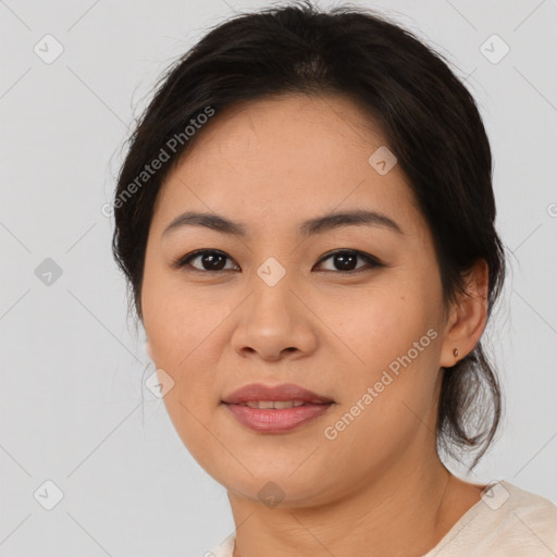 Joyful asian young-adult female with medium  brown hair and brown eyes