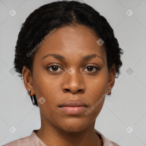 Neutral black young-adult female with short  brown hair and brown eyes