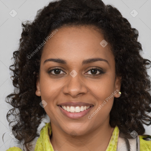 Joyful black young-adult female with medium  brown hair and brown eyes