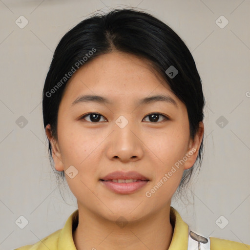 Joyful asian young-adult female with medium  brown hair and brown eyes