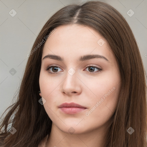 Neutral white young-adult female with long  brown hair and brown eyes