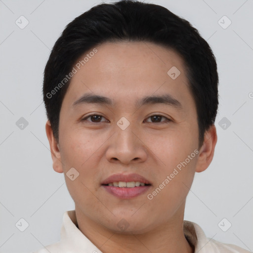 Joyful white young-adult male with short  black hair and brown eyes