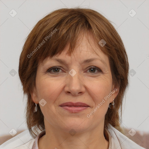 Joyful white adult female with medium  brown hair and brown eyes